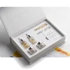 Elythra Skincare Solution Discovery Kit featuring 6 benchmark formulations, including clinical ampoules, serums, and barrier repair creams in a premium white gift box, dispatched via DHL Express.